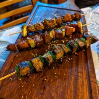 Fish, meat and sausage skewers at A Coruja in Sao Paulo