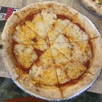 Vegan three cheese pizza!  at Pizza y Gatos in Madrid