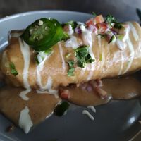 Chicken and rice chimichanga is too good to be described with words. Get it. at Casa Del Vegano in Dallas