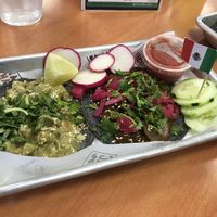 Potato pipian taco (L) and mushroom mole taco (R) at TACO NACO KC in Overland Park