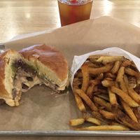 Southwest vegan burger with fries (also vegan). The chipotle mayo, guacamole & jalapenos work nicely together. at Burger Burger in Bloomington