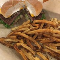 Vegan "Over the Shroom" burger. The caramelized mushrooms made the basic Impossible patty much better. Only half the fries were edible (the rest were either over or under cooked). at Burger Burger in Bloomington