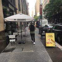 Front of venue, with some outdoor seating. at Gregory's Coffee - 33rd in New York City