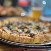 Veggie lover pizza with vegan cheesee  at Mancos Brewing Company in Mancos