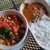 Samosa with toppings and main course dish at Chat Junction in Berlin