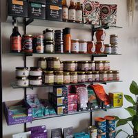 Shop shelf with chocolate, relishes etc at Barleys in Hull