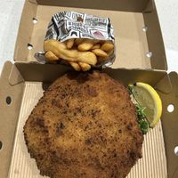 Vegan schnitzel and chips. The schnitzel was crispy and tasty, and their fries are really good as well    at Schnitz in Mill Park