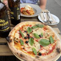 Artichoke pizza and pasta with garlic and tomatoes. Taste like Italy! 10/10 at Chutnej in Prague