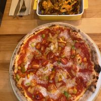 Hawaiian pizza and poutine   at Chutnej in Prague