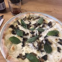 Pizza funghi a bio cola  at Chutnej in Prague
