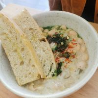 Butter beans with focaccia bread at Chutnej in Prague