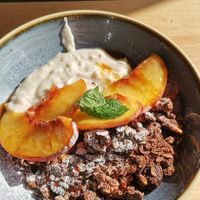 Granola and yogurt at Chutnej in Prague