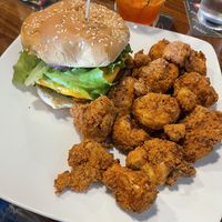 Vegan burger with fried cauliflower bites   at Transmission Arcade in Columbia