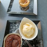 Top: pastel del nata. Bottom: lava cake at Reed in Luxembourg City