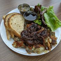 Vegan trio - sourdough toast with rhubarb butter, mixed greens salad and breakfast potatoes with caramelized onions at Short Stack Eatery in Madison