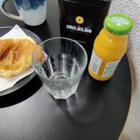 Juice and croissant with vegan cheese at AllVeggie in Alverca Do Ribatejo