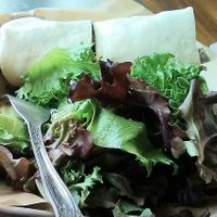 A vegan Rosendale Cafe sandwich: The Gyro Wrap with Tahini Sauce and Salad Greens as the Side. (Other gyro sauce not vegan; vegan side options are greens, potato salad, corn chips) at The Rosendale Cafe in Rosendale