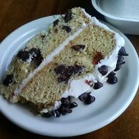 Vanilla Chocolate Chipper cake from Rosendale Cafe. Half in take-home box at back of picture. All cakes at Rosendale Cafe have always been vegan. Picture July 2021.  at The Rosendale Cafe in Rosendale