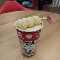 Soy milk with jasmine tea, dango and soy powder on top at Chinese Tofu Magician in Barcelona