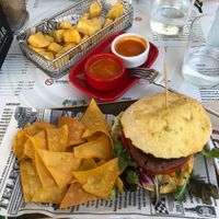 Hamburguesa vegana y patatas bravas (la salsa es vegana) at Gure Etxea in Pamplona