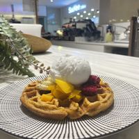Tropical waffle with supermarket in the background   at Oatberry Cafe - Scotts Square in Central Singapore