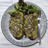Avocado Toast: GF sourdough, mashed avocado, mixed seeds, balsamic glaze.   at Oatberry Cafe - Scotts Square in Central Singapore