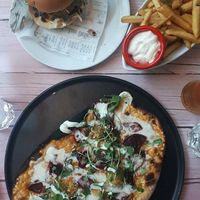 Junky burger, fries and Walk the beets -flatbread at Junk y Vegan in Helsinki