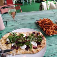 Vegan beetroot flatbread, vegan feta and sweet potato fries ✨ at Junk y Vegan in Helsinki
