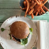 Portobello burger with sweet potato fries.  at Junk y Vegan in Helsinki