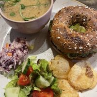 Soup and bagel served with salad and chips on the side  at Deli Gasta in Isle Of Skye