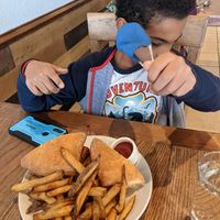 Nashville Hot Chicken with fries at Yummvees in Richmond