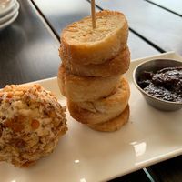 Cheese ball with crostini and fig jam  at Yummvees in Richmond