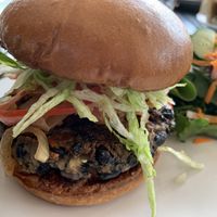 Bacon and cheese burger with house salad. The croutons! 🤩🤩🤩 The bean and grain burger is amazing!  at Yummvees in Richmond