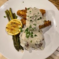 Gravy, fried chick’n, mashed potatoes, asparagus   at Yummvees in Richmond