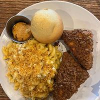 Chicken Mac n cheese cornbread muffin with a sweet heat butter absolutely wonderful  at Yummvees in Richmond