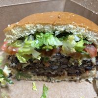 The Bacon burger.  I ate half.  The homemade fries were in the air frier warming up.  at Yummvees in Richmond