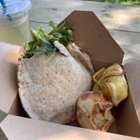 Loaded pita w/ hummus and baked tofu. Side of v hand pies  at Hani Honey Company in Stuart