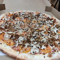 Vegan cheese, tomatoes, meatless crumbles, mushrooms at M3 Pizza in Southside Place