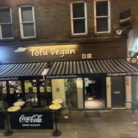 front of restaurant   at Tofu Vegan - Islington in North London