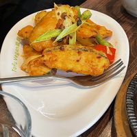 Twice cooked fish. Separately sold bao buns with sauce as their speciality dish are available  at Tofu Vegan - Islington in North London