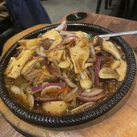 Sizzling fried king o'ster mushroom with black pepper sauce  at Tofu Vegan - Islington in North London