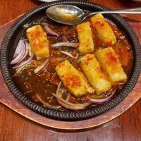 Sizzling tofu in house special sauce at Tofu Vegan - Islington in North London