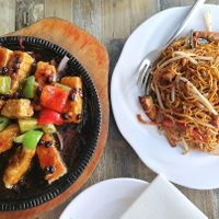 Sizzling tofu in black bean sauce and fried noodles with tofu at Tofu Vegan - Islington in North London