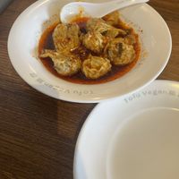 Wontons in a house special sauce  at Tofu Vegan - Islington in North London