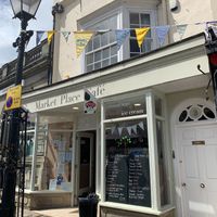 Lots of indoor and outdoor seating, dog friendly too :) at Market Place Cafe in Wells
