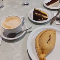 Vg pasty, choc orange cake and oat milk latte at Market Place Cafe in Wells