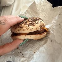 Sausage & chz on an everything bagel   at Curiosity Coffee Bar in Columbia