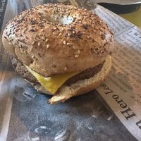 Vegan sausage and cheese on an everything bagel  at Curiosity Coffee Bar in Columbia