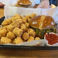 Green goblin with a single order of tots  at Wizard Burger in Albany