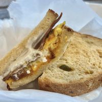 The Night Out, my favorite (bacon, egg, cheddar cheese, and cream cheese on red hot chili pepper bread)  at Take Two Cafe in Schenectady